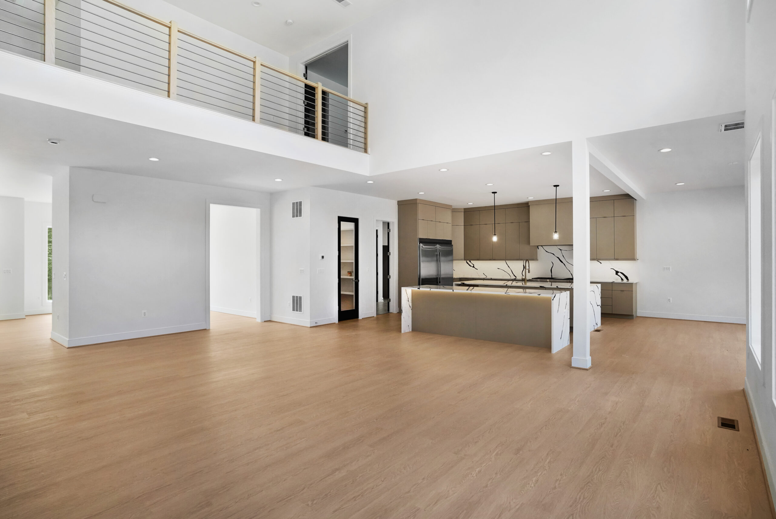 Open-concept living space and modern kitchen