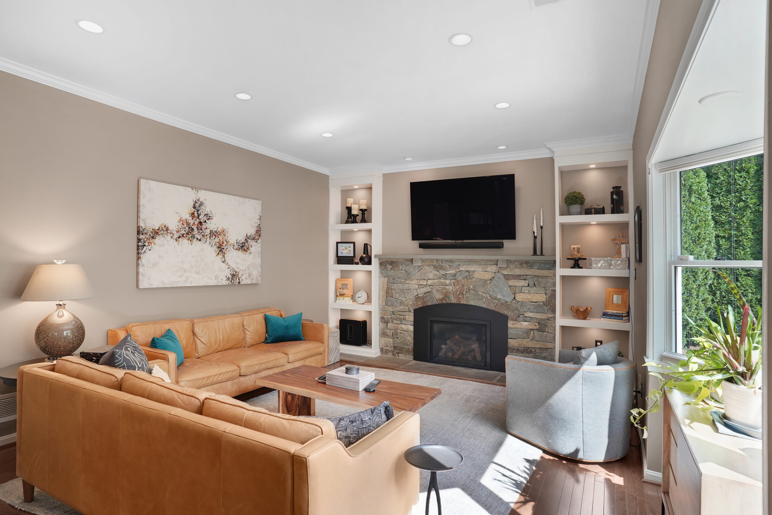 Warm family room with stone fireplace